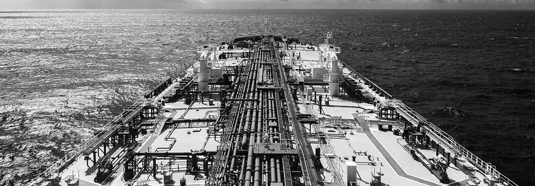 Airview of the oil tanker deck in blue sea